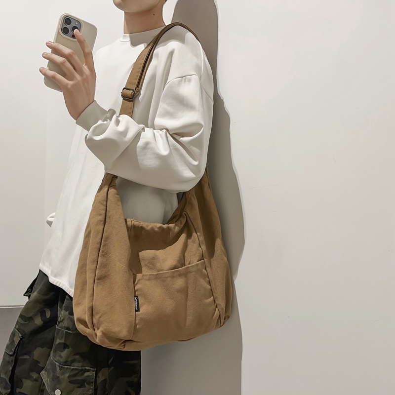 2024 nuevo estilo de ocio, arte, lona de gran capacidad para damas, bolso de mensajero de hombro de viaje de todo fósforo de moda para hombres