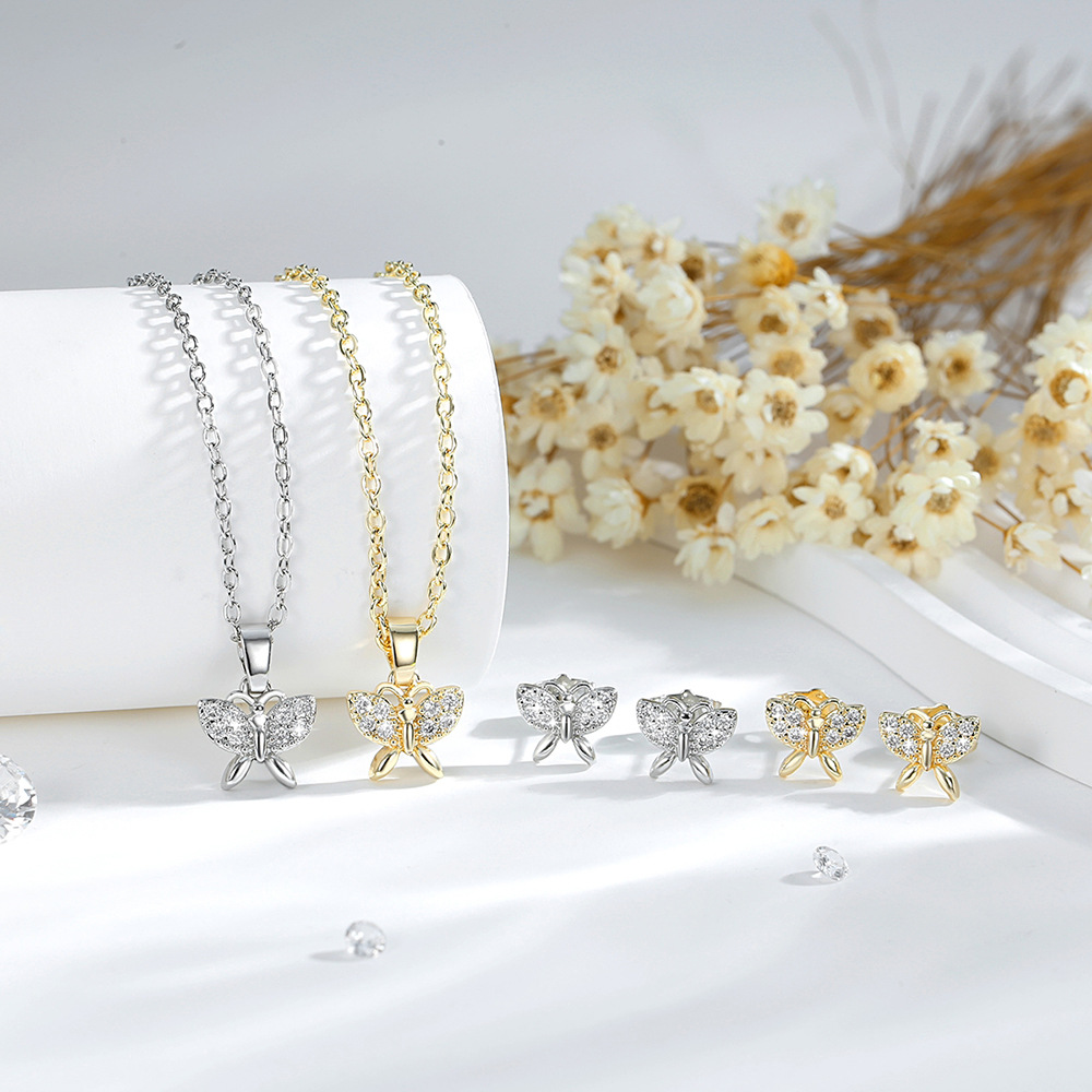 Nicho de moda mariposa conjunto de joyería para mujeres 14K oro zircon colgante mariposa pendientes venta caliente transfronteriza