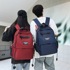 新しいビジネスシンプルな無地コンピュータバックパック大学高校バッグキャンパスキャンバスバックパック男性と女性の通勤