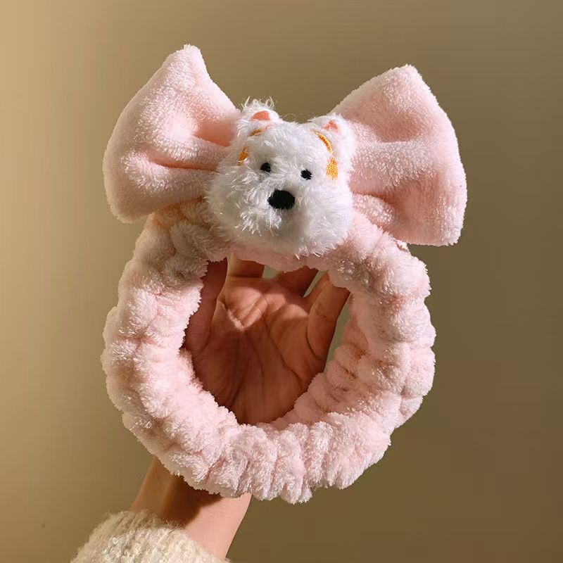 西高地の子犬のぬいぐるみのヘアバンドは顔を洗って化粧します。|undefined