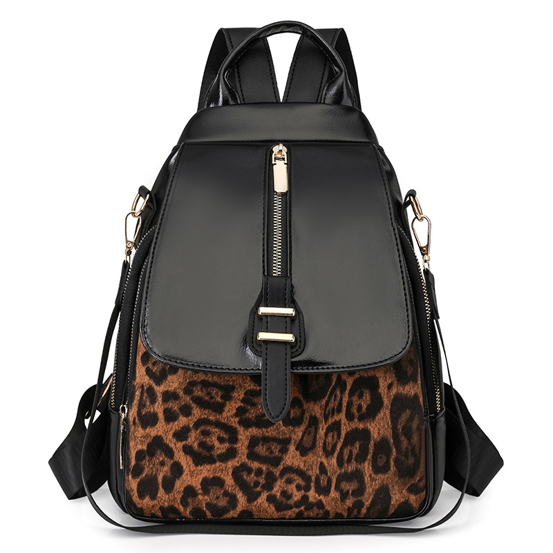 2025 primavera nuevo comercio exterior retro mochila casual impresión de tendencia de contraste de color moda al aire libre versátil gran capacidad