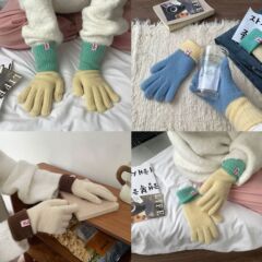 色の指の手袋にぶつかります。女性のかわいい風は色を合わせて長くします。