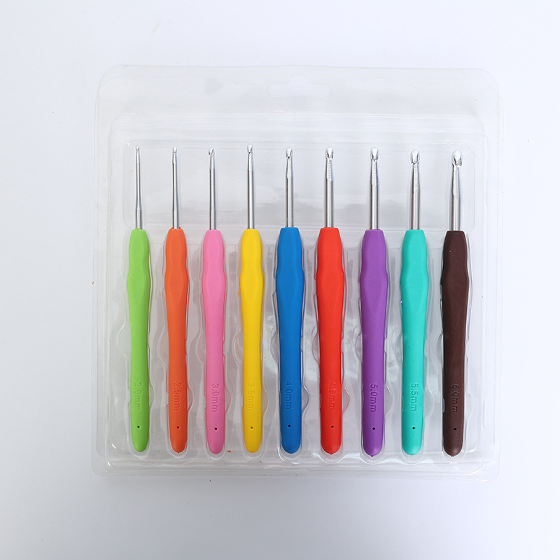 Comercio exterior bwy Arco Iris mango suave crochet TPR mango suave sólido mango suave gancho de ganchillo de aluminio traje de lana aguja