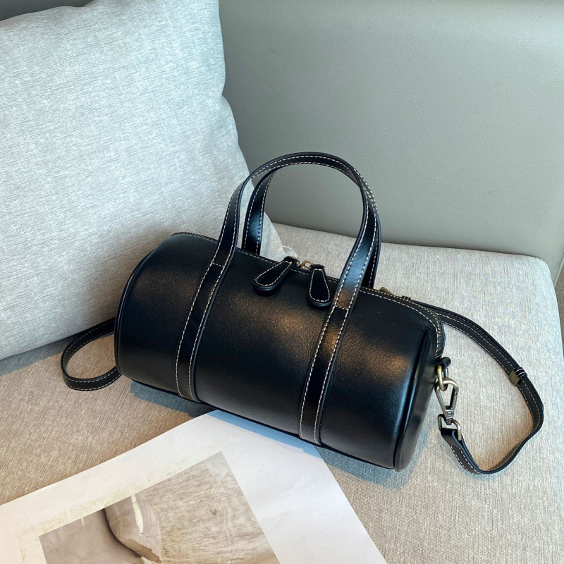 植なめしの上の牛革の枕の包みの女性の高級感の百合の小さい大衆のハンドバッグの女子学生のファッションのボストンバッグの女性