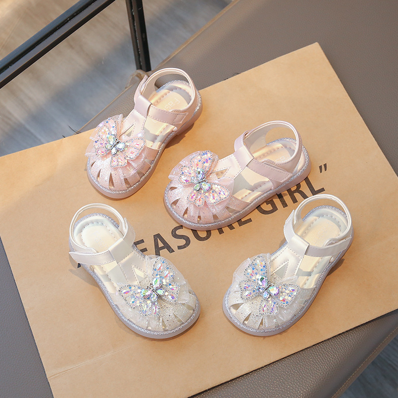 Sandálias de niñas verano 2026 nuevas niñas zapatos de sola suave para bebés mujeres zapatos de princesa de estilo romano