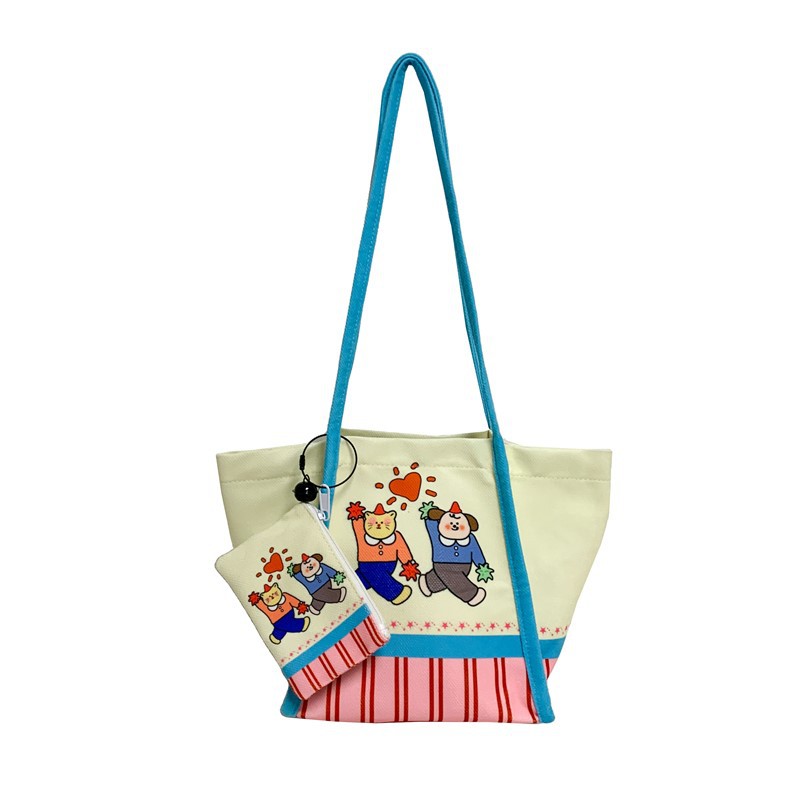 Bolsa de lona de dibujos animados japoneses 2025 nuevo bolso de gran capacidad para estudiantes de escuela primaria bolso de hombro para hombres y mujeres