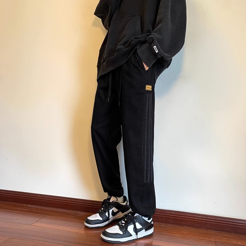 Marca de moda americana retro alta sensación negro con vaqueros de lana hombre otoño invierno casual a rayas pantalones harun