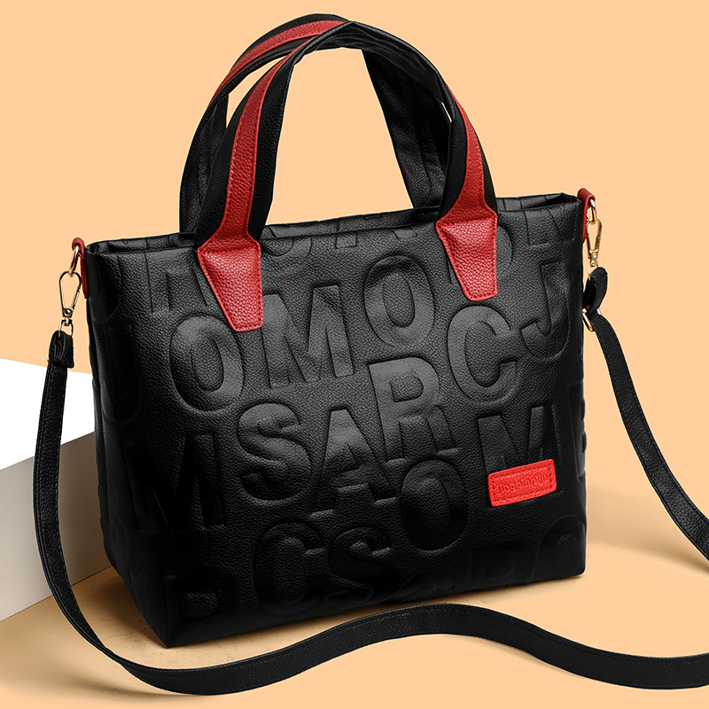 Comercio exterior transfronterizo nuevo bolso de mano de moda elegante Carta en relieve de moda europea y americana de gran capacidad bolso de hombro
