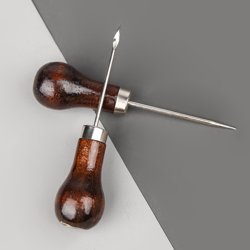 Fabricante al por mayor calabaza mango de madera maciza cono de aguja cuero punzón de ojo de perforación de bricolaje hecho a mano zapatos de reparación zapatos Qianbitong