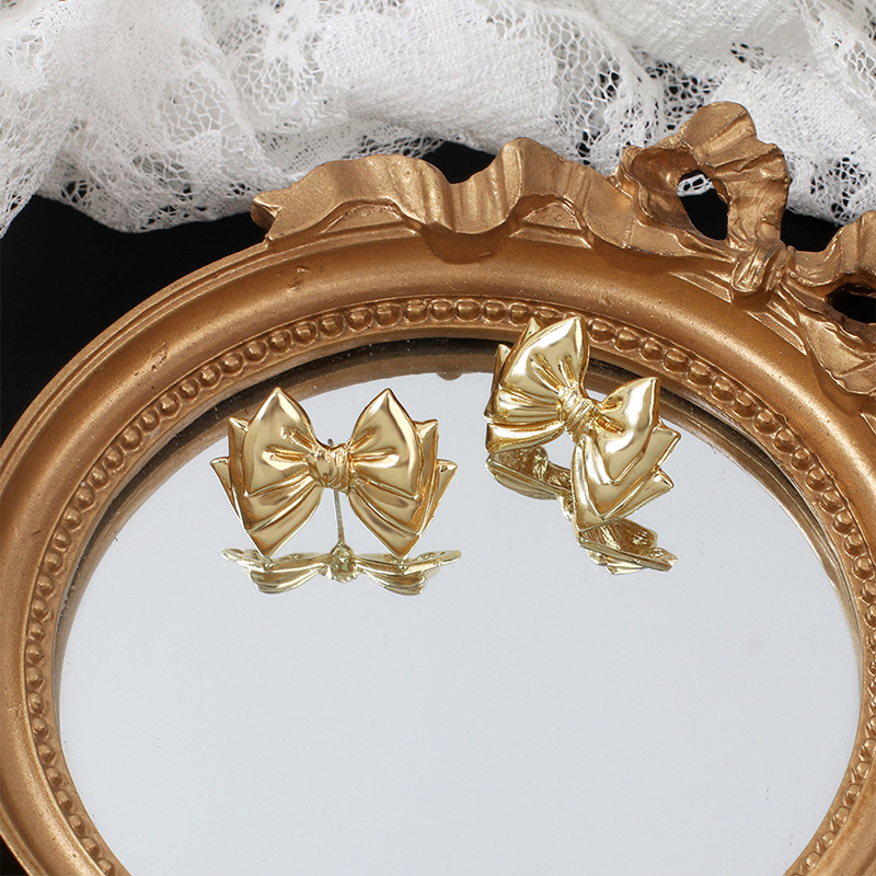 4g Weight Earrings Classification Wedding, Travel Occasion Women'S Gender Gold Color Wholesale Fashion Geometric Multi-layer Bow Alloy Earrings 1