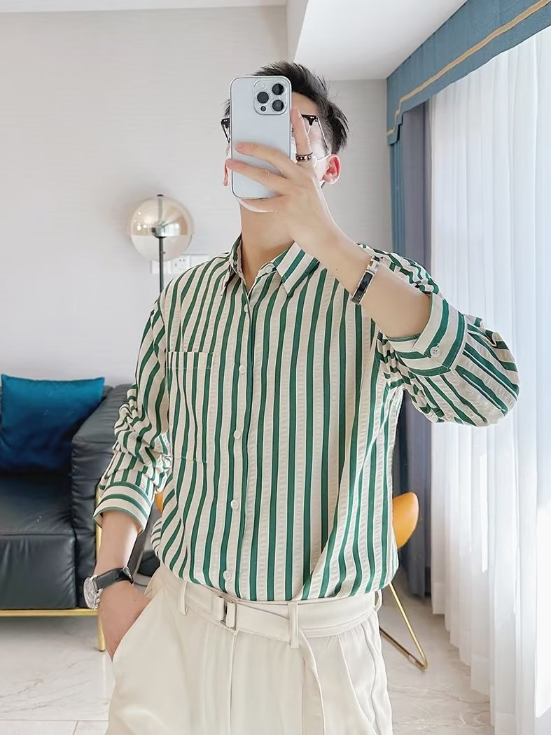 Camisa de manga larga a rayas verticales casual de negocios para hombres Camisa de primavera y otoño para hombres Camisa delgada de lujo ligero de tendencia