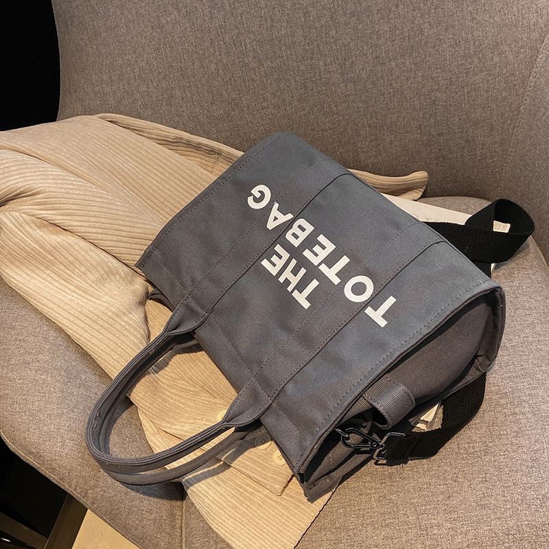 Bolso de mano para mujer, nuevo bolso práctico de lona con nudo transfronterizo, de gran capacidad, adecuado para el trabajo y los desplazamientos, se puede llevar como bolso de hombro o bandolera.