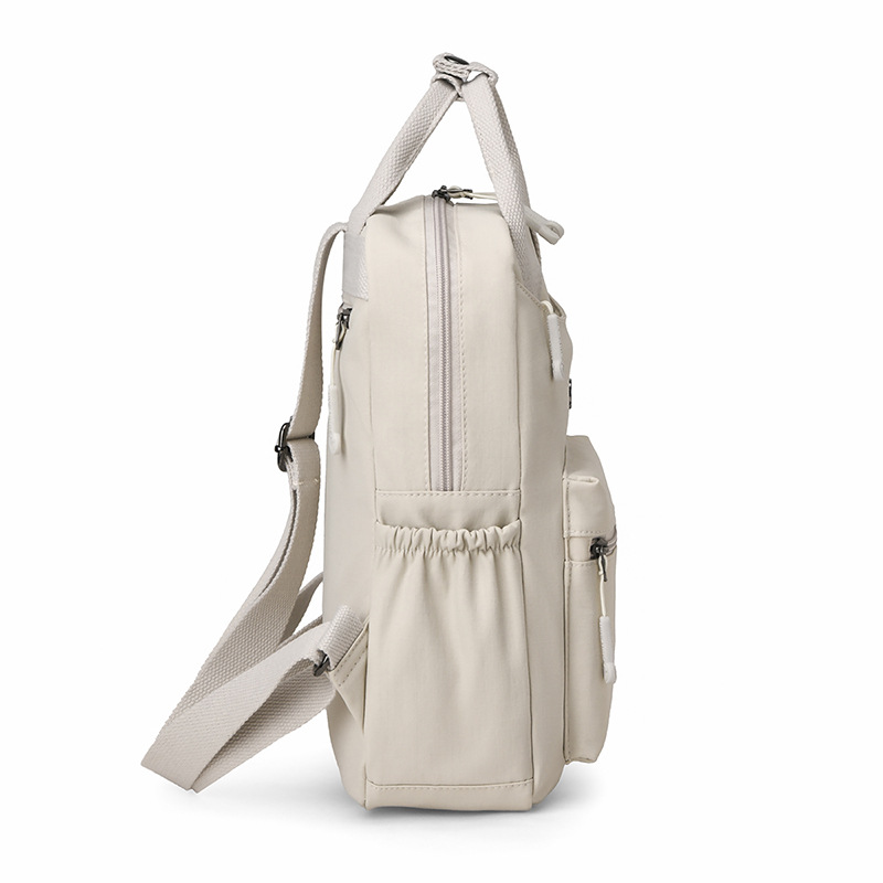 Mochila de tela de nailon de color sólido de moda transfronteriza, nueva moda, todo fósforo, mochila de viaje para mujer de gran capacidad