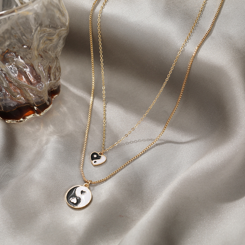 Großhandel Kreative Einfache Tropfen Öl Tai Chi Herz Anhänger Doppel Halskette Nihaojewelry display picture 6