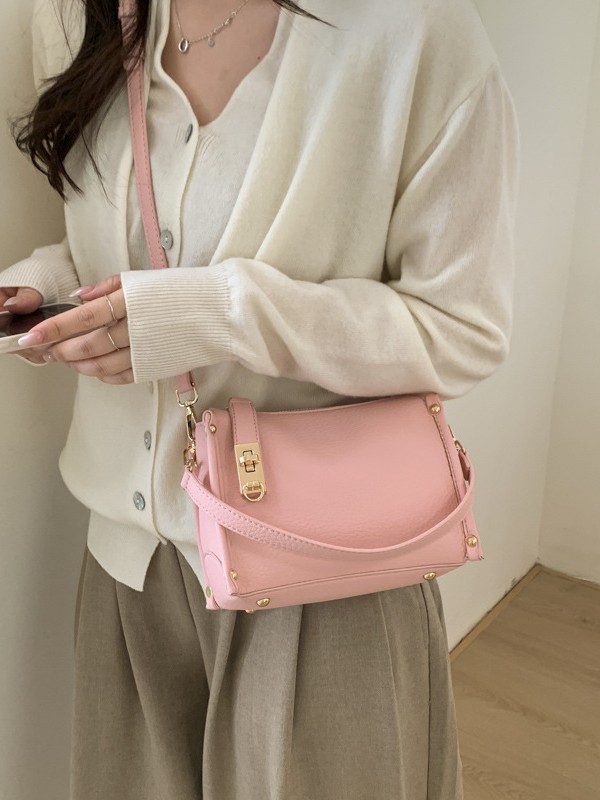 Nicho Zhong textura bolso de mujer 2026 nuevo remaches de gran capacidad simple de hombro simple bolso de brazo de viaje