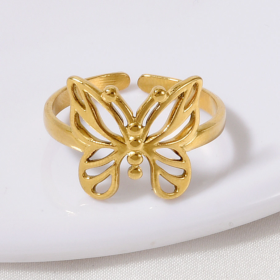 High-end Stainless Steel Couple Ring 18k Gold Hollow Pattern_voghion.com