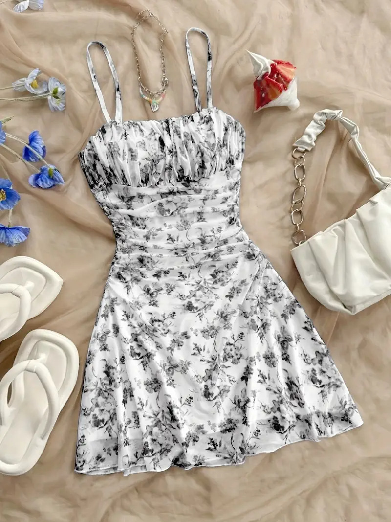 2026 French-Style Floral Spaghetti Strap Dress with Waist-Cinching V-Neck Design, Casual Beach Vacation Dress for Photoshoots at the Seaside