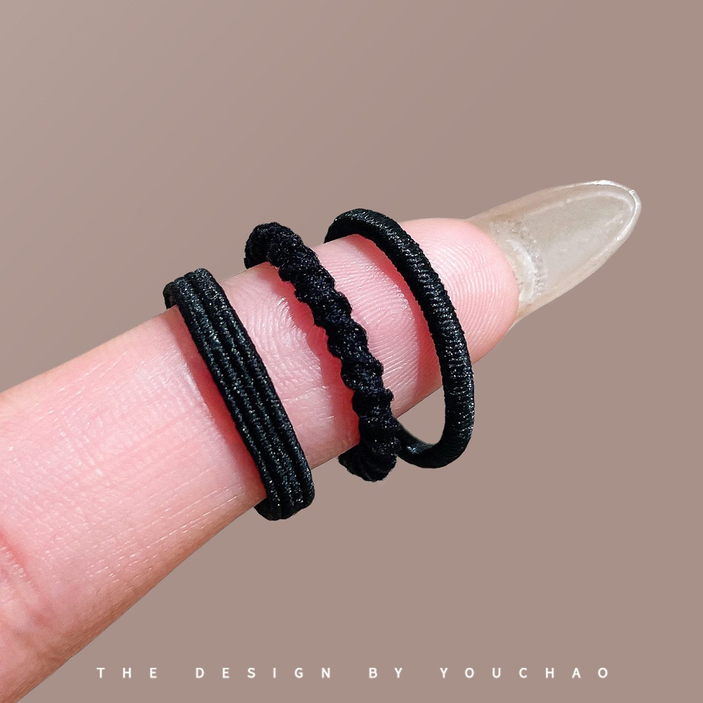Anillo de pelo de pulgar negro simple para niñas enlatadas cordón de cabello 2026 nuevo cordón de cabeza de alta elasticidad adornamiento para el cabello