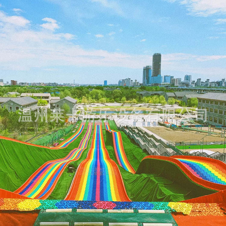 Red famosa tierra seca arco iris corredera fábrica de equipos de juego al aire libre a gran escala expansión colorida instalaciones de patinaje seco arco iris