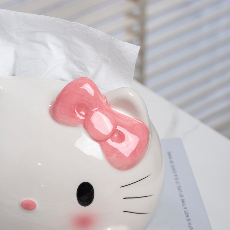 陶磁器のハローキティの漫画のティッシュの箱のかわいい創意のナプキンの箱の少女の心のデスクトップの置物のケイティは紙を引き出します。
