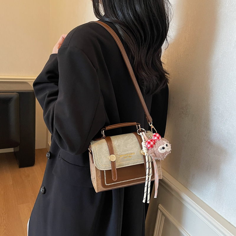 Bolso de mano doble estilo inglés de estilo extranjero 2025, otoño y invierno nuevo estilo de bolso de mujer relajado, bolso de hombro casual.