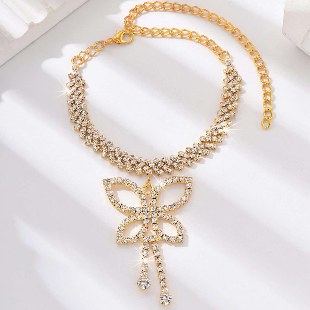 Accesorios sexuales europeos y estadounidenses cruzados nuevos productos diamantos mariposa personalidad tobillo de tobillo de diamante de playa