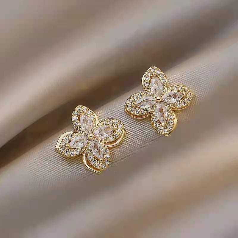 New Fashion Special-interest Design Rotating Windmill Four Leaf Clover Ear Stud Women's Rotatable Elegant Wild Earrings Earrings display picture 3