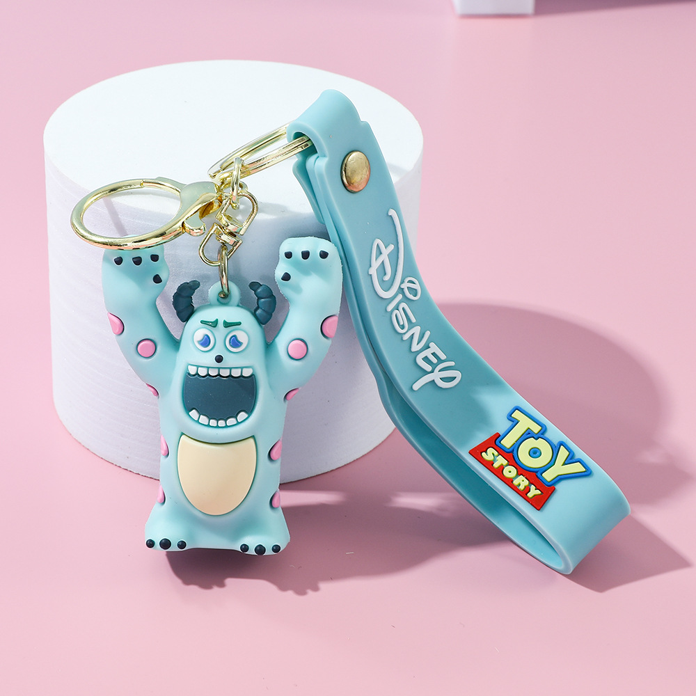 Llavero de silicona de Toy Story, el popular dibujo animado, con personajes como el alienígena de tres ojos, Buzz Lightyear y el oso Lotso, ideal como adorno para bolso.