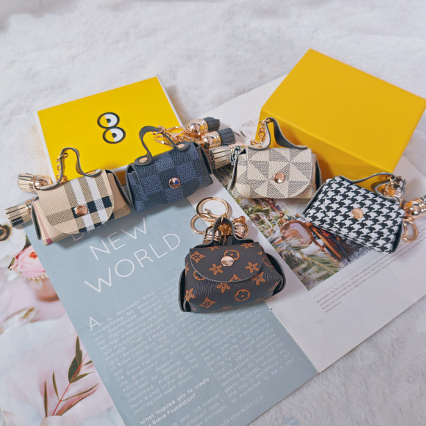 Creative small fragrant style PU small bag keychain tassel change purse portable mini headphones small bag pendant wholesale