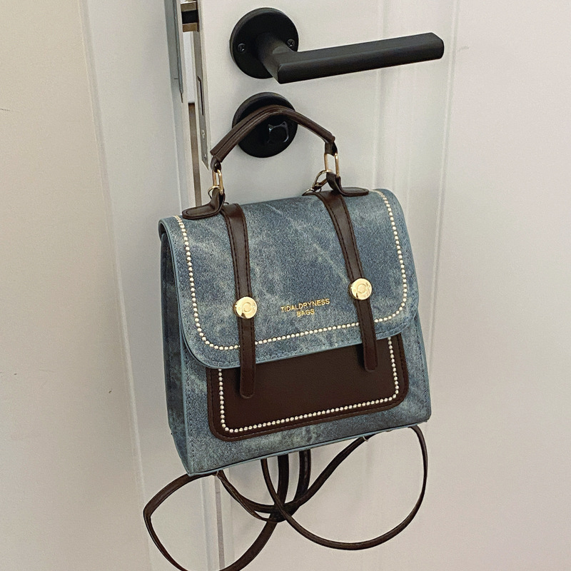 Alta sensación de vaquero pequeño una bolsa de tres mochilas para mujeres 2024 nueva moda mochila de viaje corto