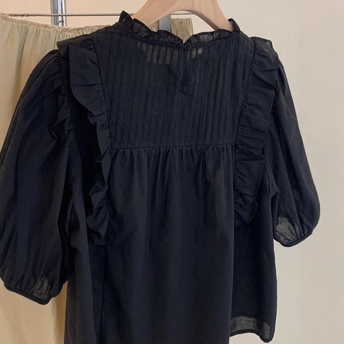 Black shirt with loose pleated ruffles, doll-style top—summer new arrival, forest-inspired solid color, sweet short-sleeved, niche design that won’t clash with others.