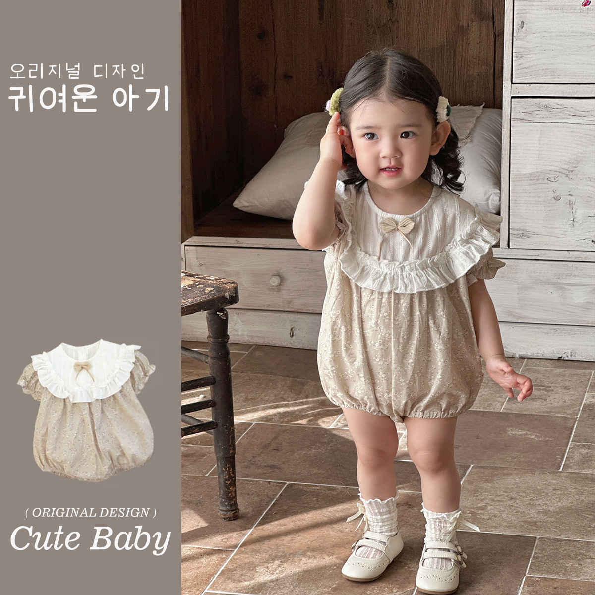 Verano para bebés nuevo estilo mampara de manga corta con costuras florales, ropa de salida para bebés y niños pequeños, ropa de pedo para bebés lindos