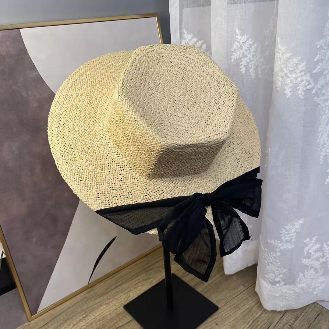 A female hat with a spring and summer ribbon, butterfly sash, hexagonal straw hat, Korean street style, anti-ultraviolet sun hat, and a wide-brimmed hat detail image 4