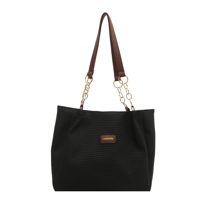 Bolso de viaje de gran capacidad para mujer 2025 verano nuevo estilo de alta gama bolso de axila de un solo hombro popular de este año bolso Tote femenino