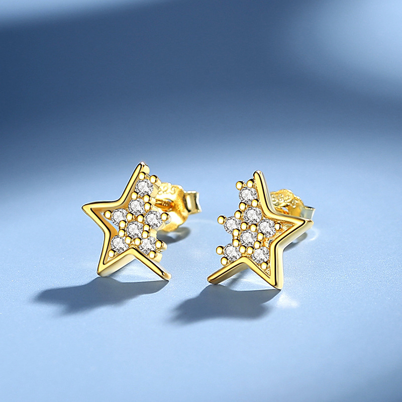 Pendientes de plata aguja femenina creativa estrellas pendientes de plata s925 al por mayor diamante diseño coreano SENTIDO DE Japón y Corea viento