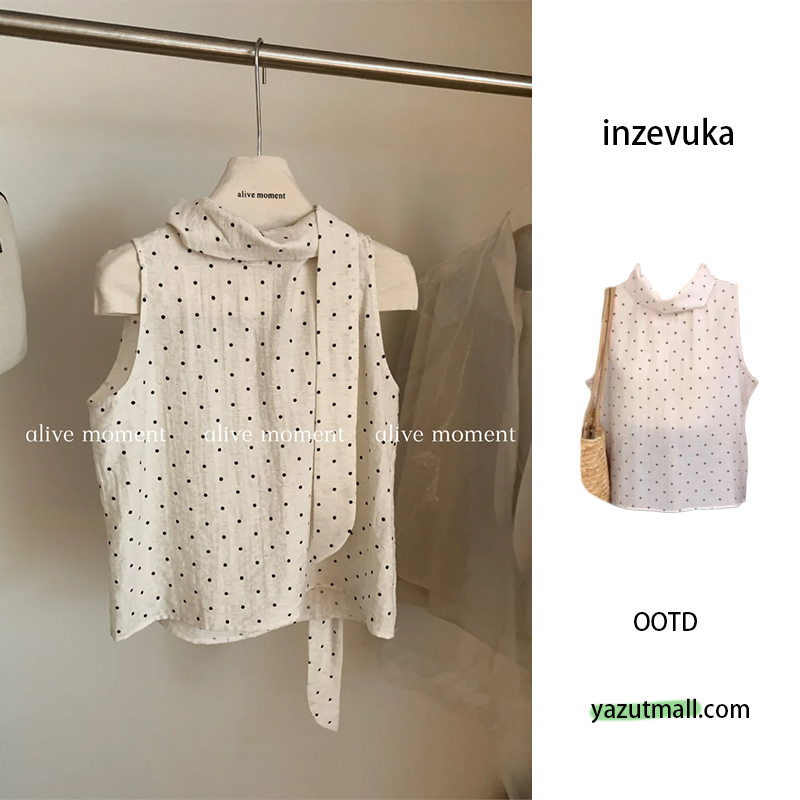 White small design shirt sleevless with bow