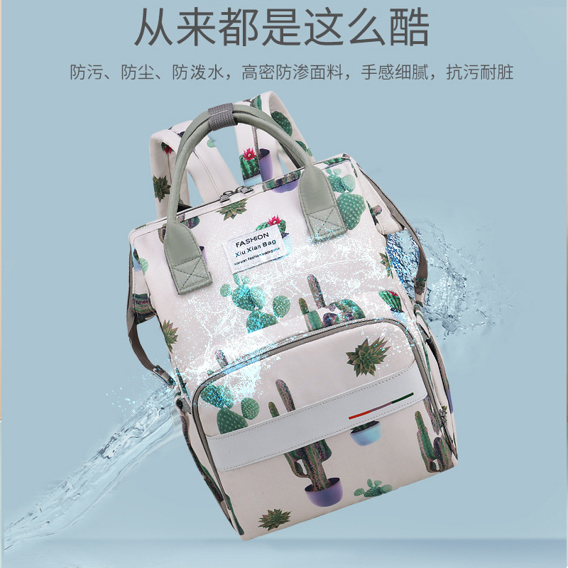 Multifuncional nueva bolsa de mamá puede colgar cochecito de aluminio aislamiento bolsa de madre y bebé anti-derramamiento multiuso mochila