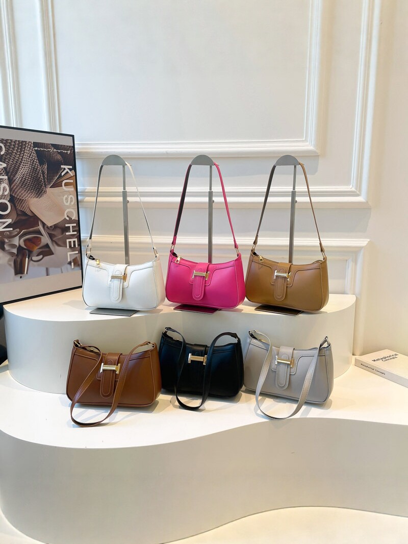 2025 nueva moda versátil bolso de brazo de mujer sensación de alto nivel bolso de hombro simple nicho de diseño de mano de viaje