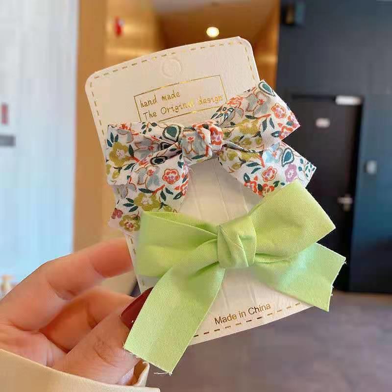 Estilo coreano fresco floral arco horquilla niños macaron color presión clip flujo mar clip lateral traje accesorios para el cabello