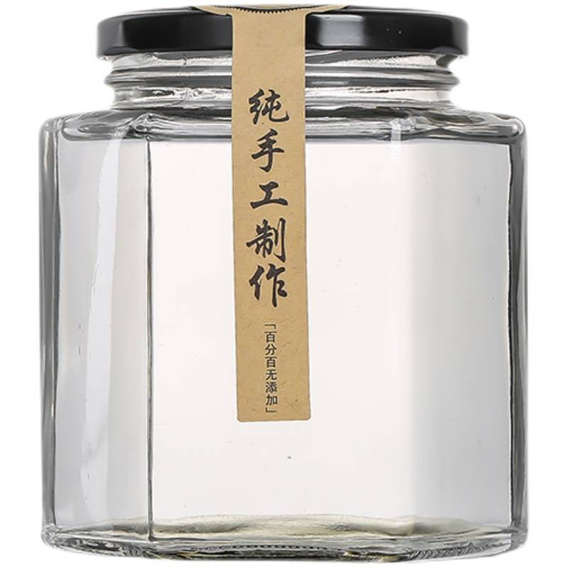 Hexagonal de vidrio enlatado sellado de grado alimenticio con tapa vacía un kilo de pasta de limón, miel, pimienta, botella de mermelada