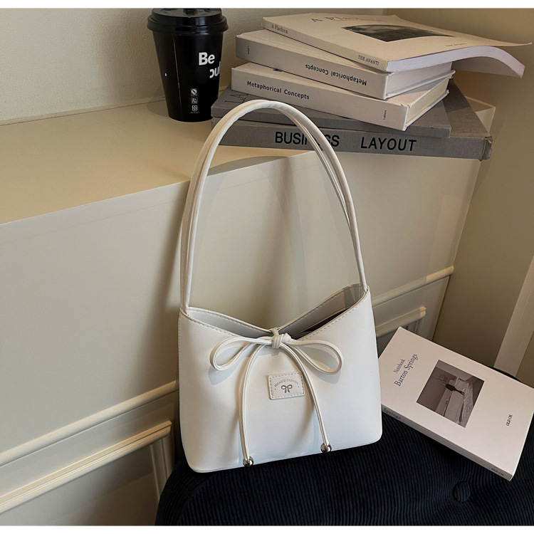 Women's fashion bucket bag 2025 new retro handbag, bow single-shoulder bag, solid color versatile underarm bag undefined