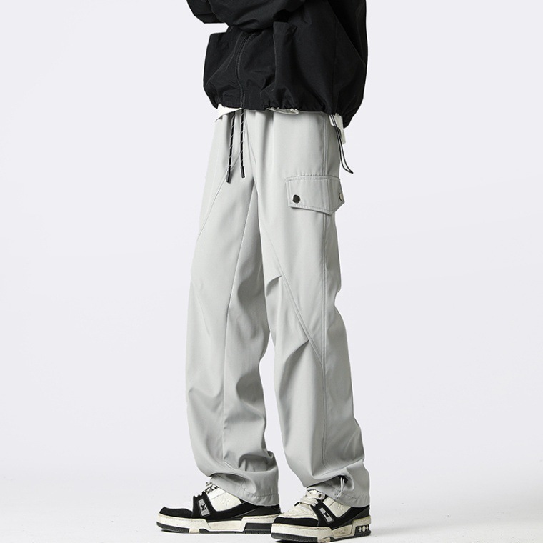 Otoño y invierno explosión de terciopelo más grueso para hombres herramientas de ocio de moda de pantalones deportivos elásticos sueltos de moda para hombres