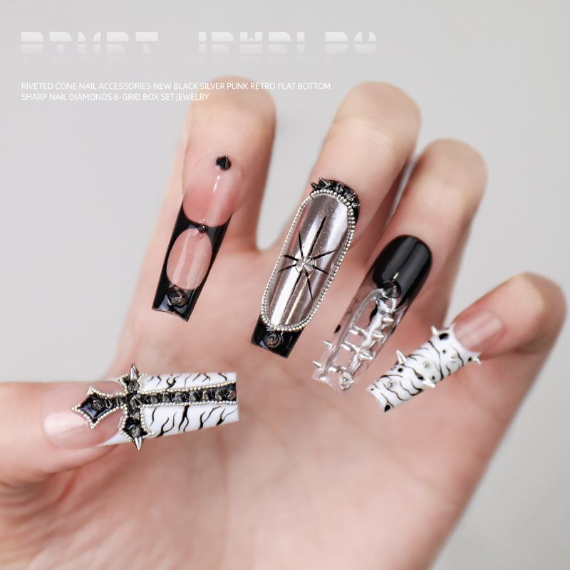 Red de celebridades Nail Art Remache Wear Armor Caja de 6 cuadrículas Mezcla Mini bala francesa Punk Metal Nail Decoración al por mayor