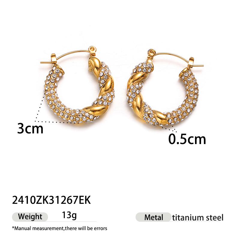 Moda europea y americana de alta calidad de textura de torsión pernos de orejas incrustados con zircon amor simple y versátil otoño e invierno temperamento pendientes