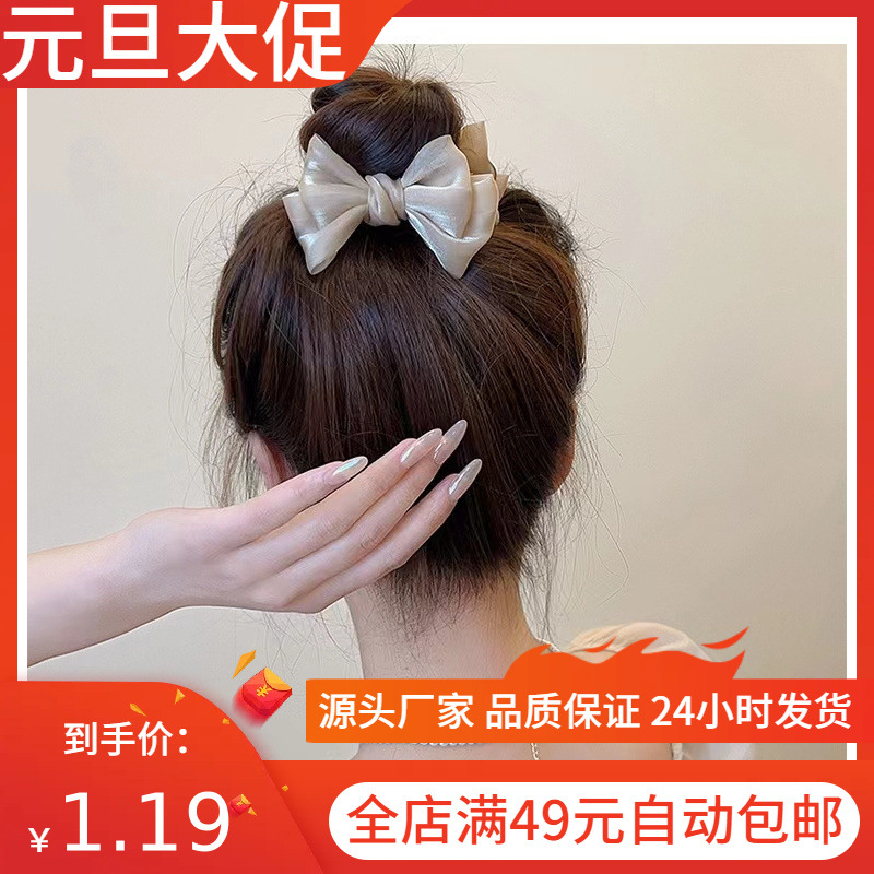 優雅な蝶結びの丸子の頭はネットの赤い2023年の新型の気質のヘアピンの女性の後頭部のクリップの頭飾りをつかみます。