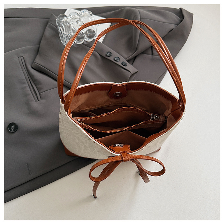 Simple and large-capacity tote bag for women 2025 new style in a two-color Korean-style casual underarm bag with a bow, fashionable and sweet undefined