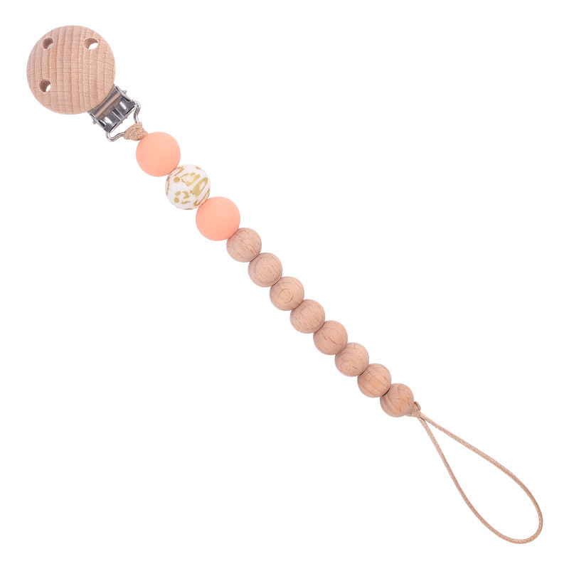 Nuevos suministros para bebés Beech chupete clip calmante bebé macaron cuentas impresas mordedura chupete cadena anti-caída de la cadena