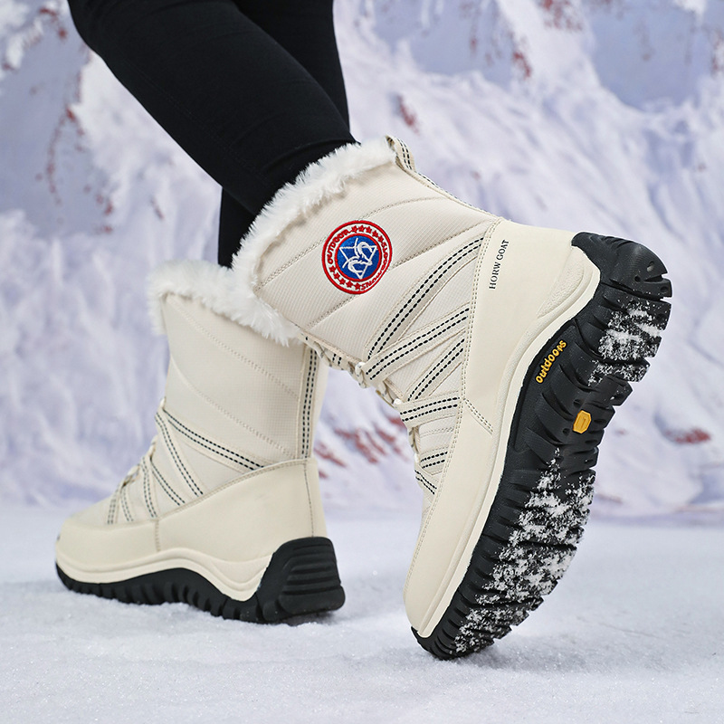 Fabricantes al por mayor botas de nieve impermeables antideslizantes para mujeres, calentamiento de algodón de alta calidad, botas de mujer Kayle Stone