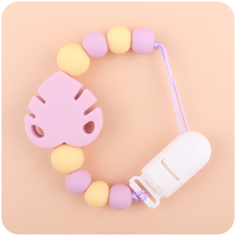 Suministros para bebés chupete cadena creativa bebé dibujos animados hojas silicona mordedura cadena anti-gota molar Nuevo