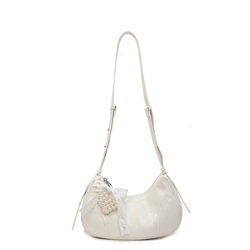 Bolso de axila de textura de alta calidad 2025 verano nuevo bolso femenino moda patrón de agarre de mano bolso bandolera con letras extranjeras